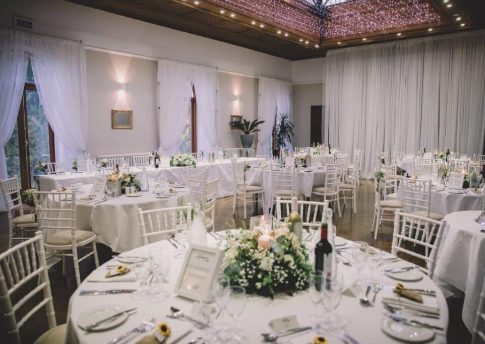Wedding reception room with white decoration
