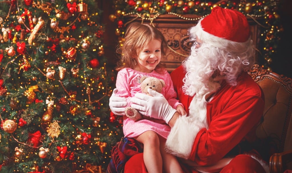 Santa Claus talking to girl