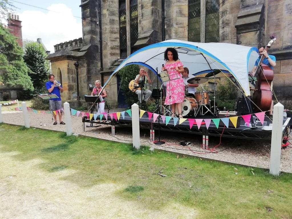 Jazz Band performing outside a church