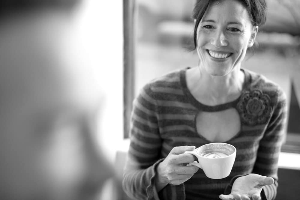 Woman holding a cup of coffee