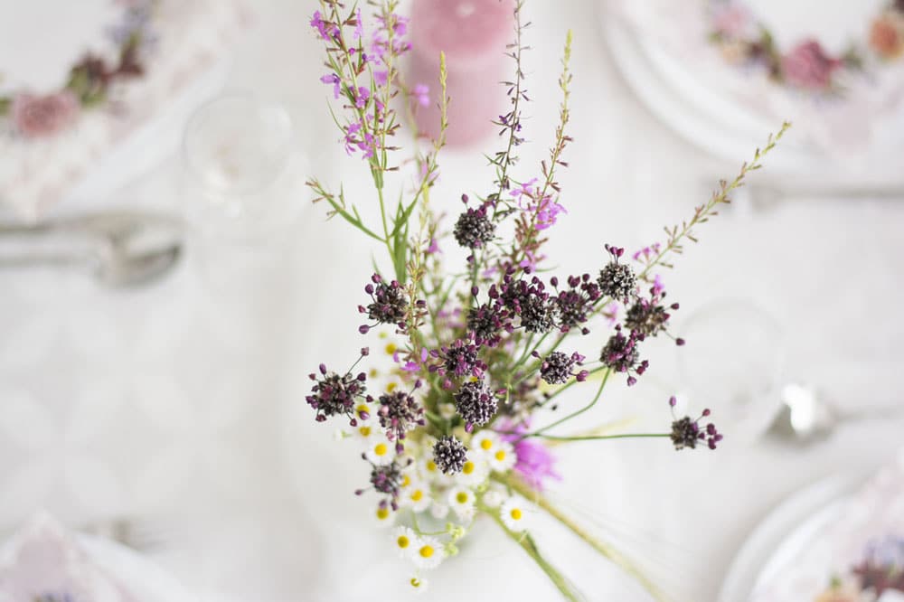 Flowers in a jar on a table