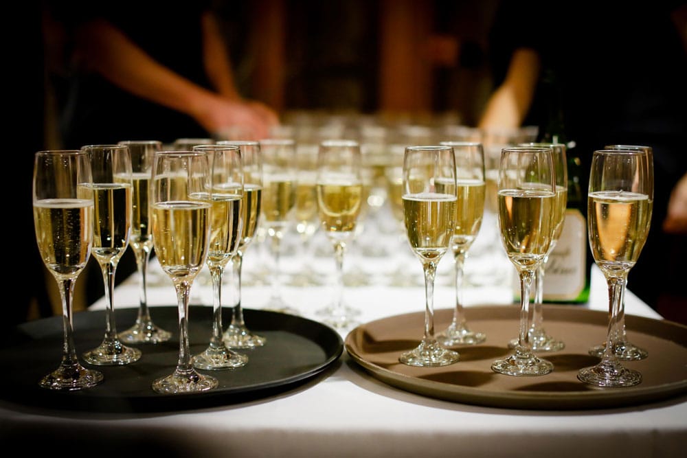 Table full of glasses of champagne