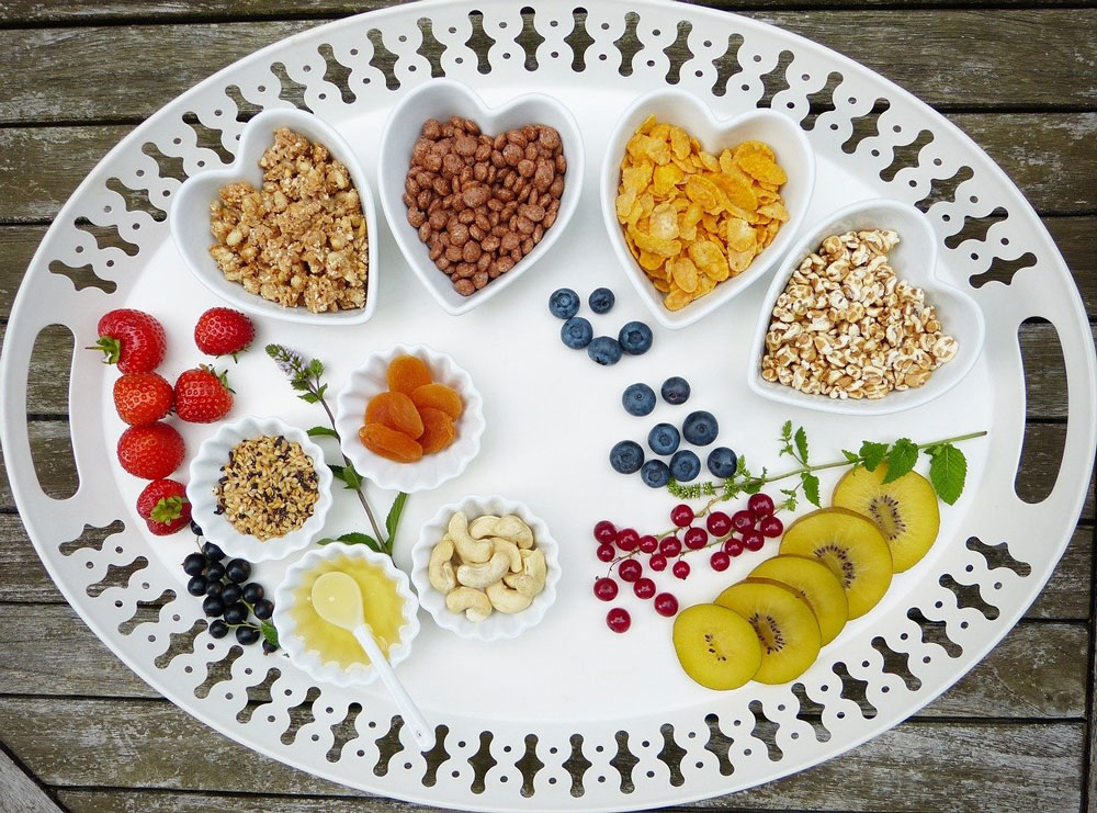 Tray with cereal, dried fruits and fruits