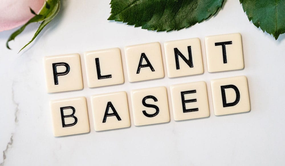 Scrabble tiles spelling "Plant Based"