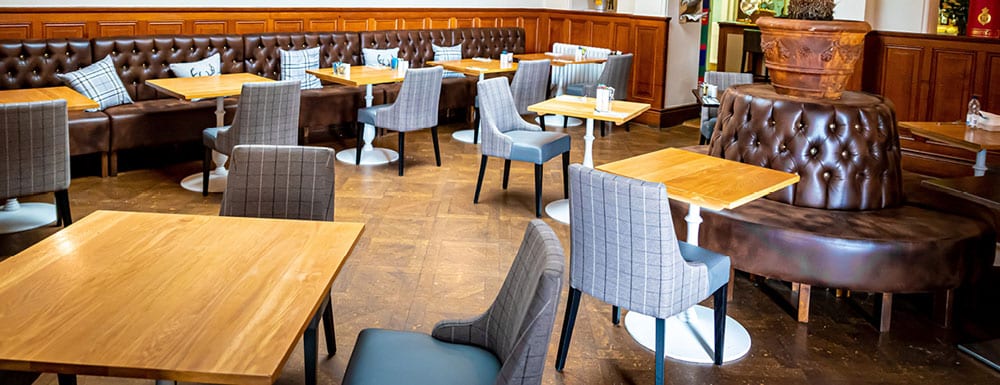 Restaurant dining area with tables and chairs