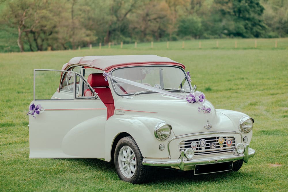 Vintage White Car with wedding decorations