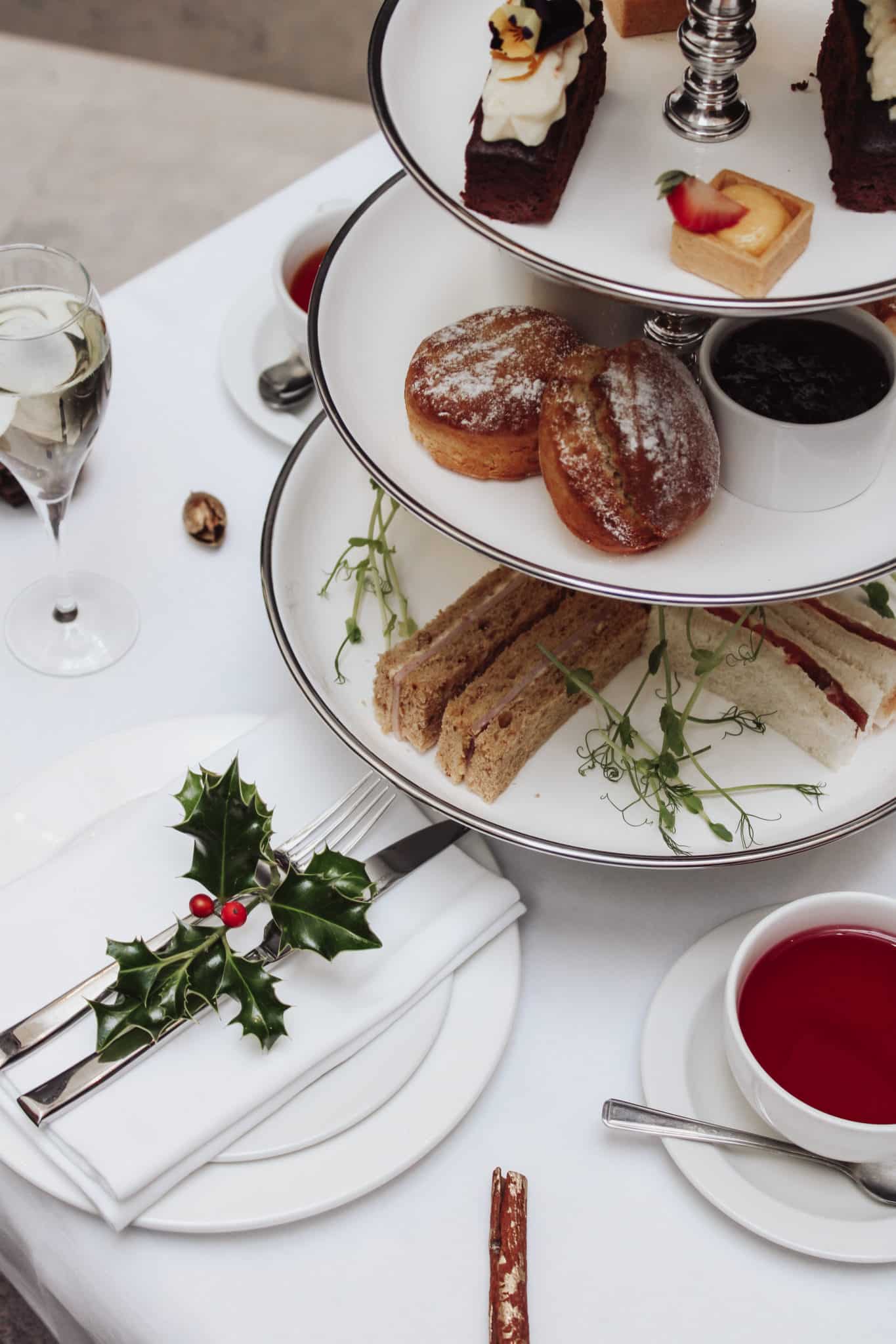 Christmas themed afternoon tea with snack, pastries and mistletoe