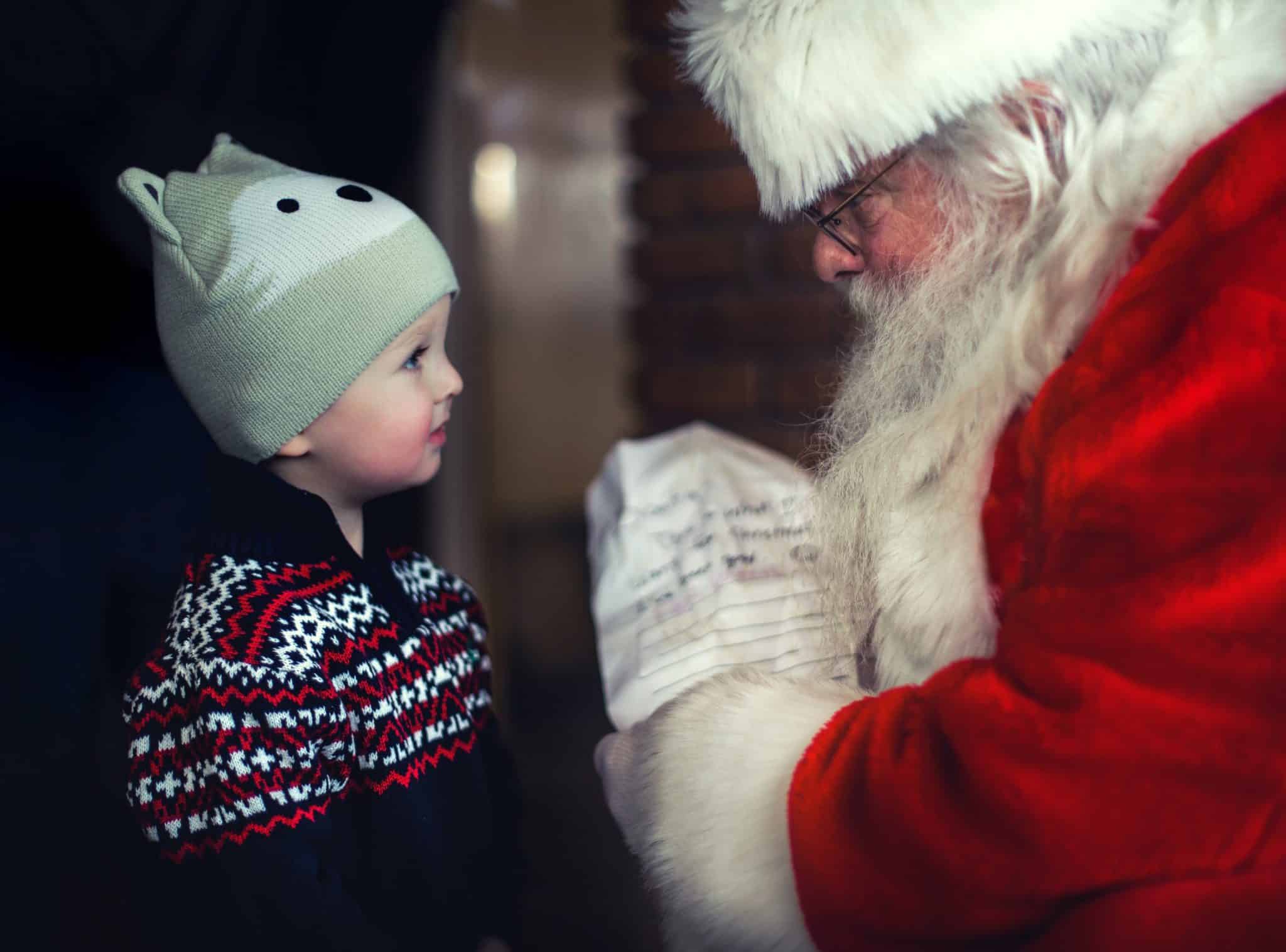 Santa talking to a little boy