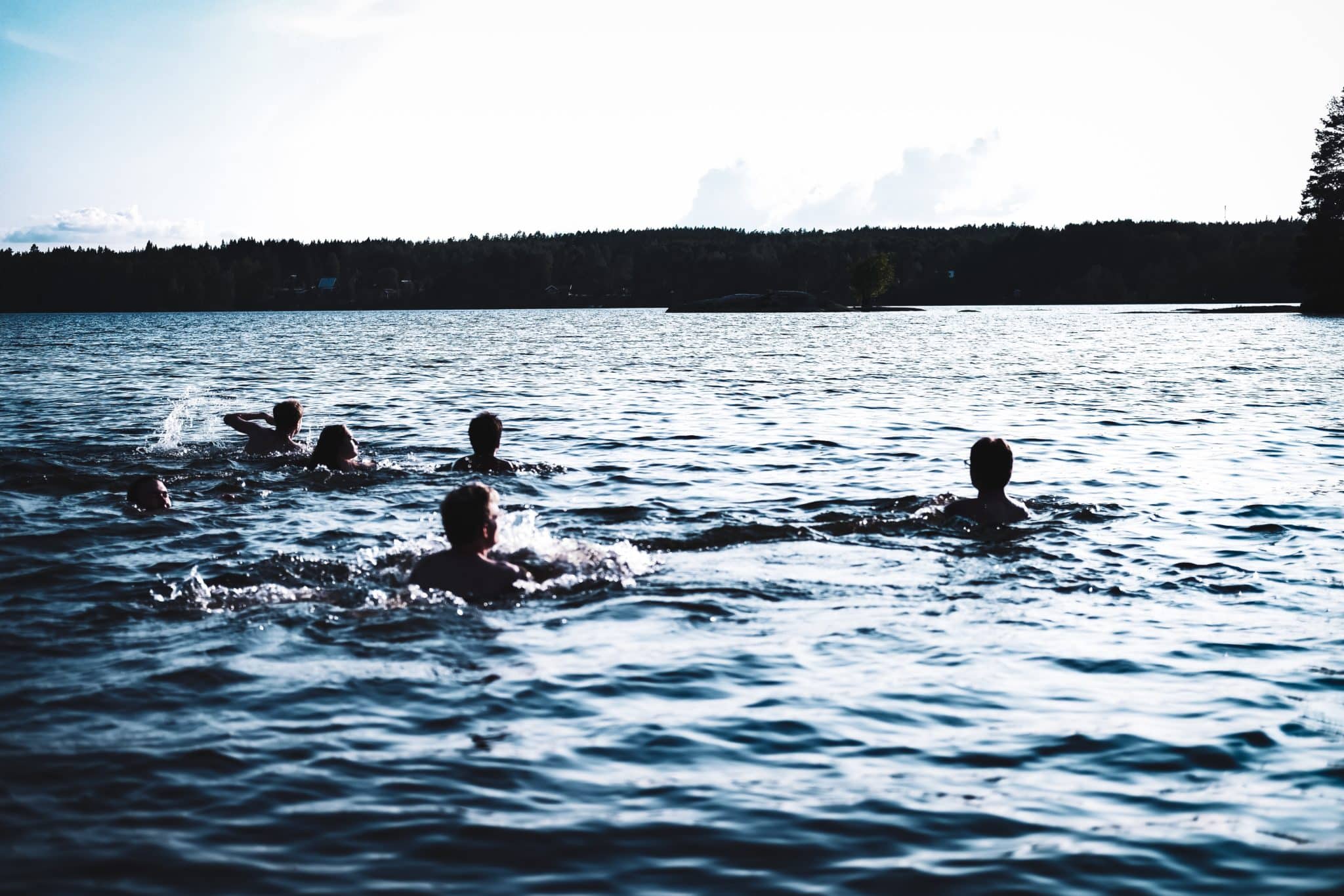 group of swimmers enjoying the open water