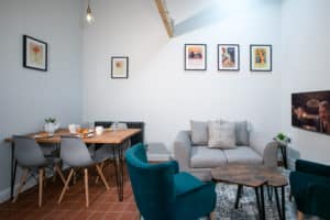 Living area with pastries served on a table