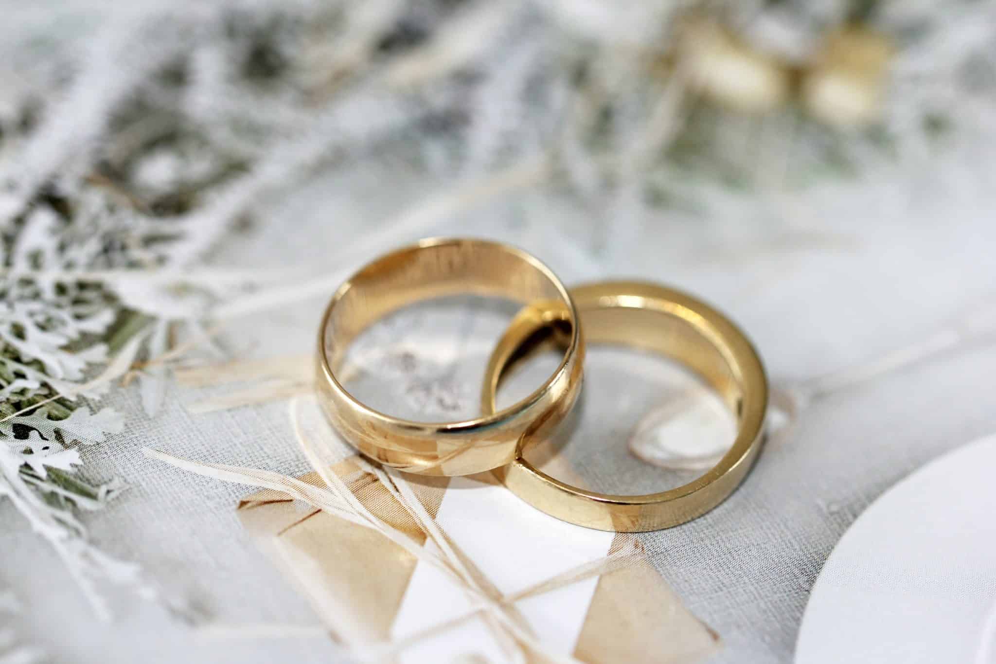 two gold wedding rings purchased after engagement