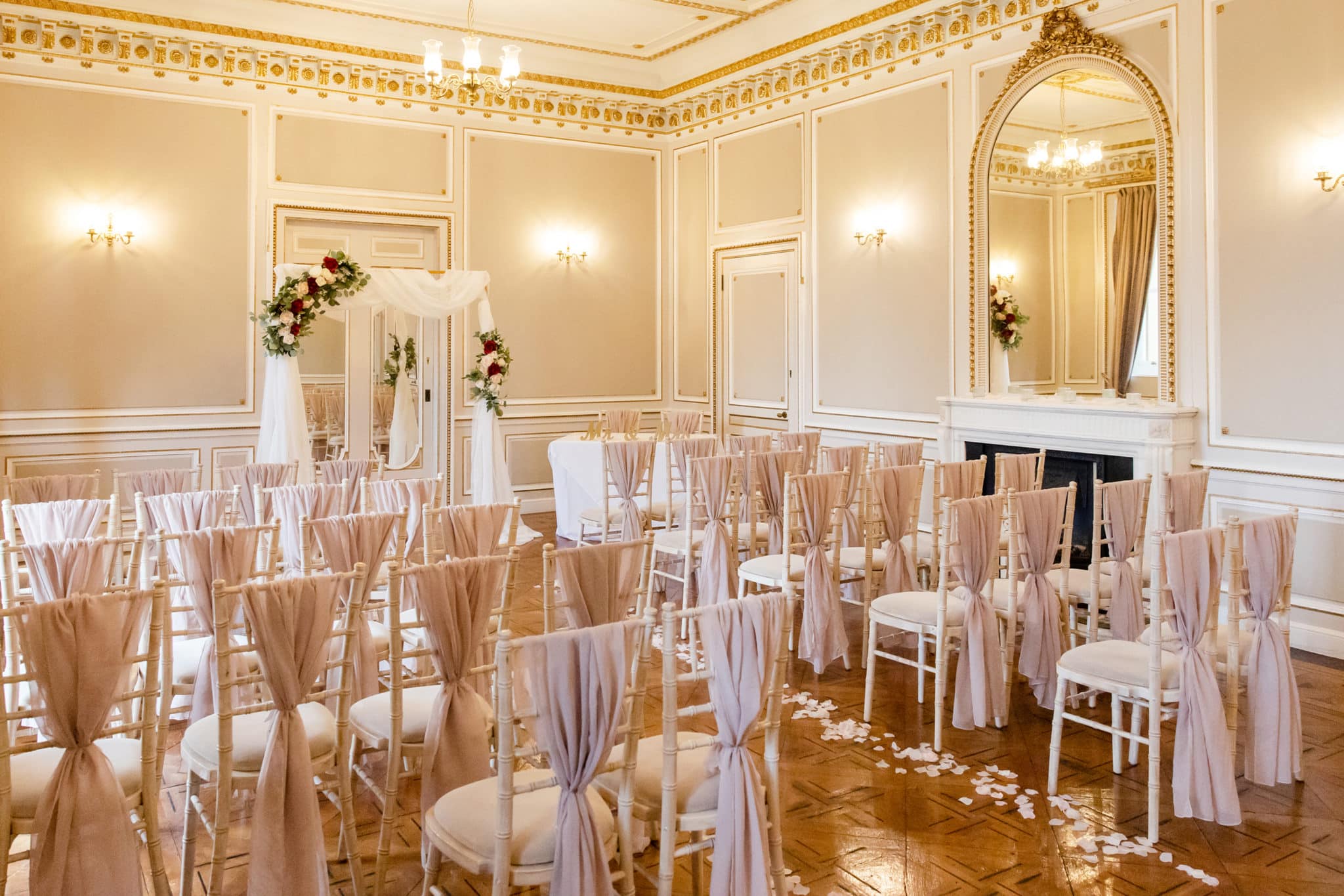 The gold room at Salomons ready to receive wedding guests