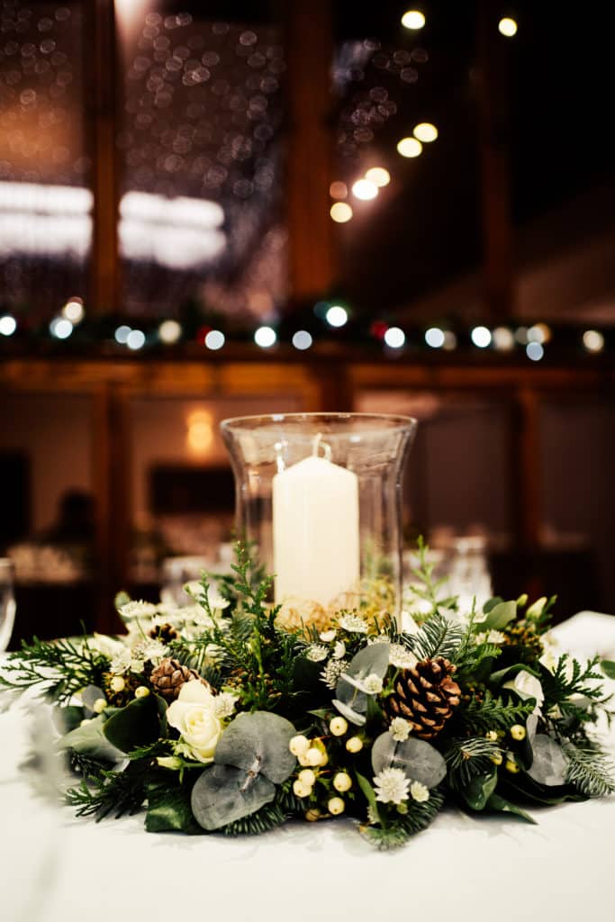 Candle and flower arrangement