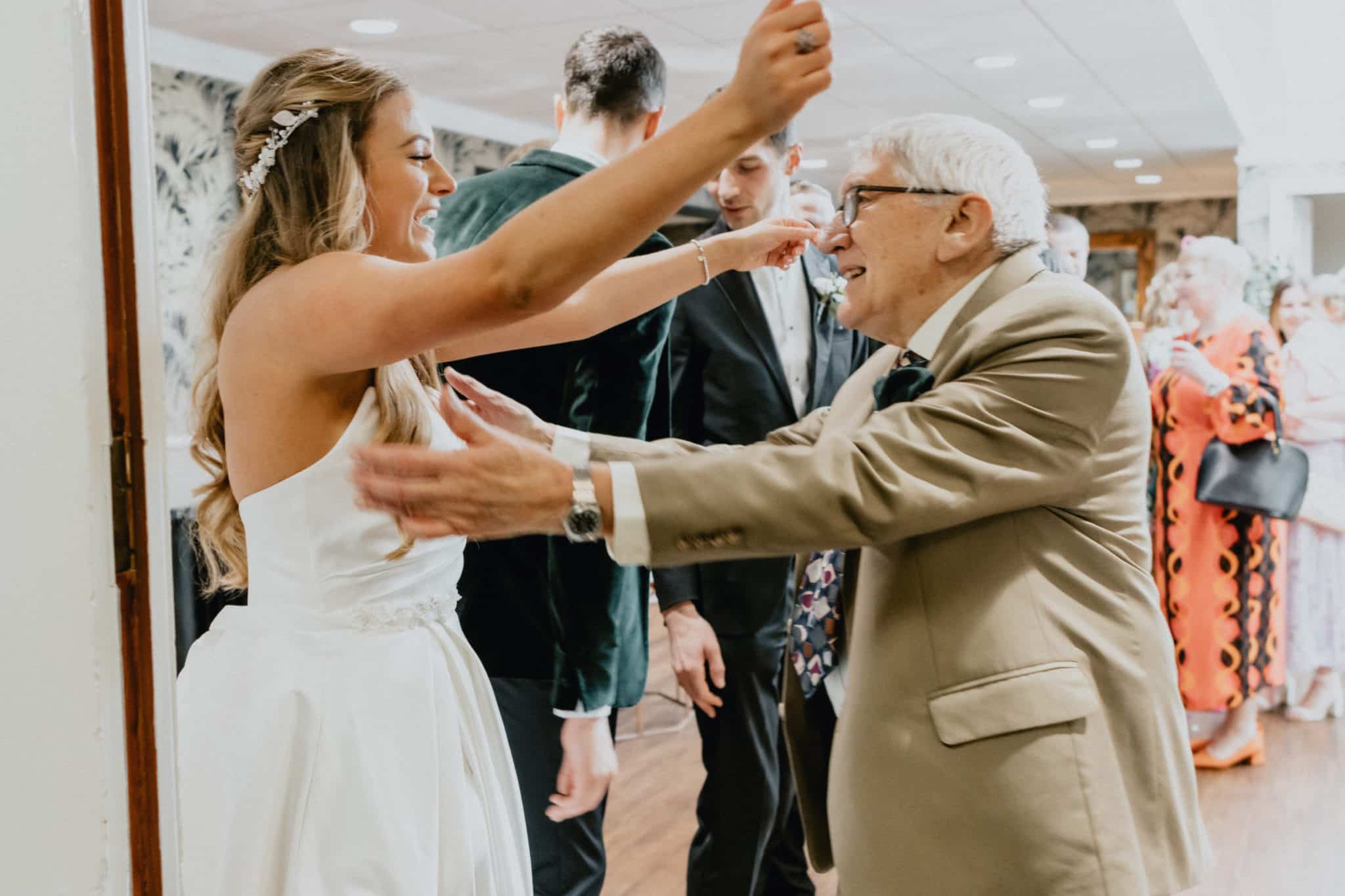 bride and grandfather dancing